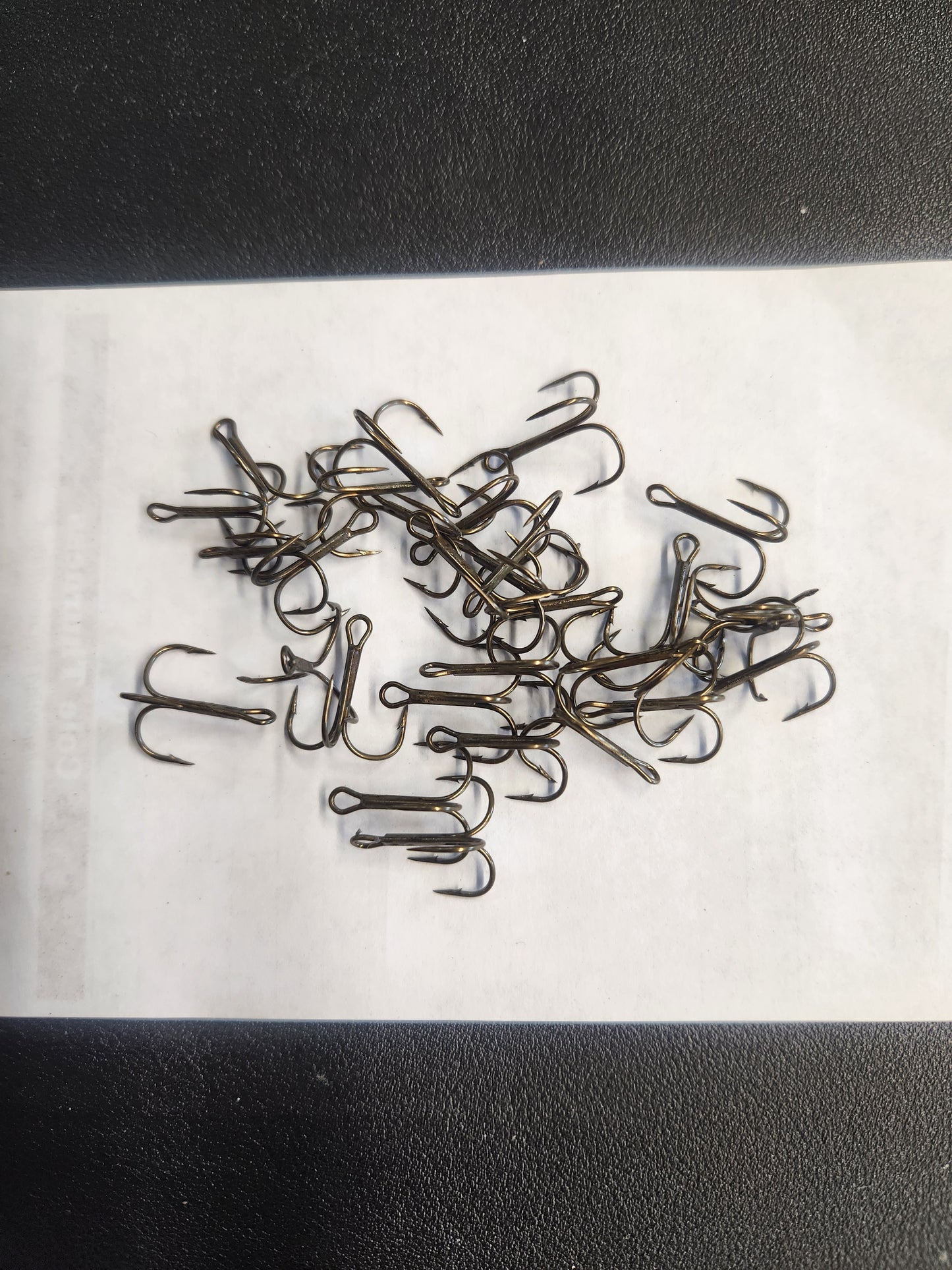 Clam Shell of Doc's treble hooks