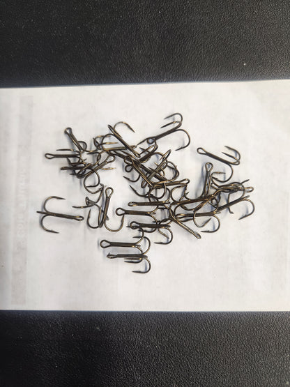 Clam Shell of Doc's treble hooks